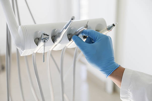 Professional Tooth Extraction technician working in Mathews County County, VA